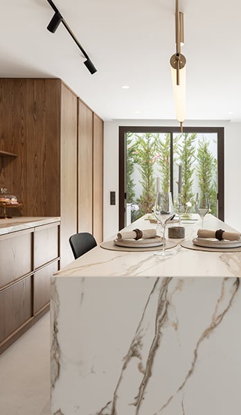 Open kitchen with access to porch and summer kitchen