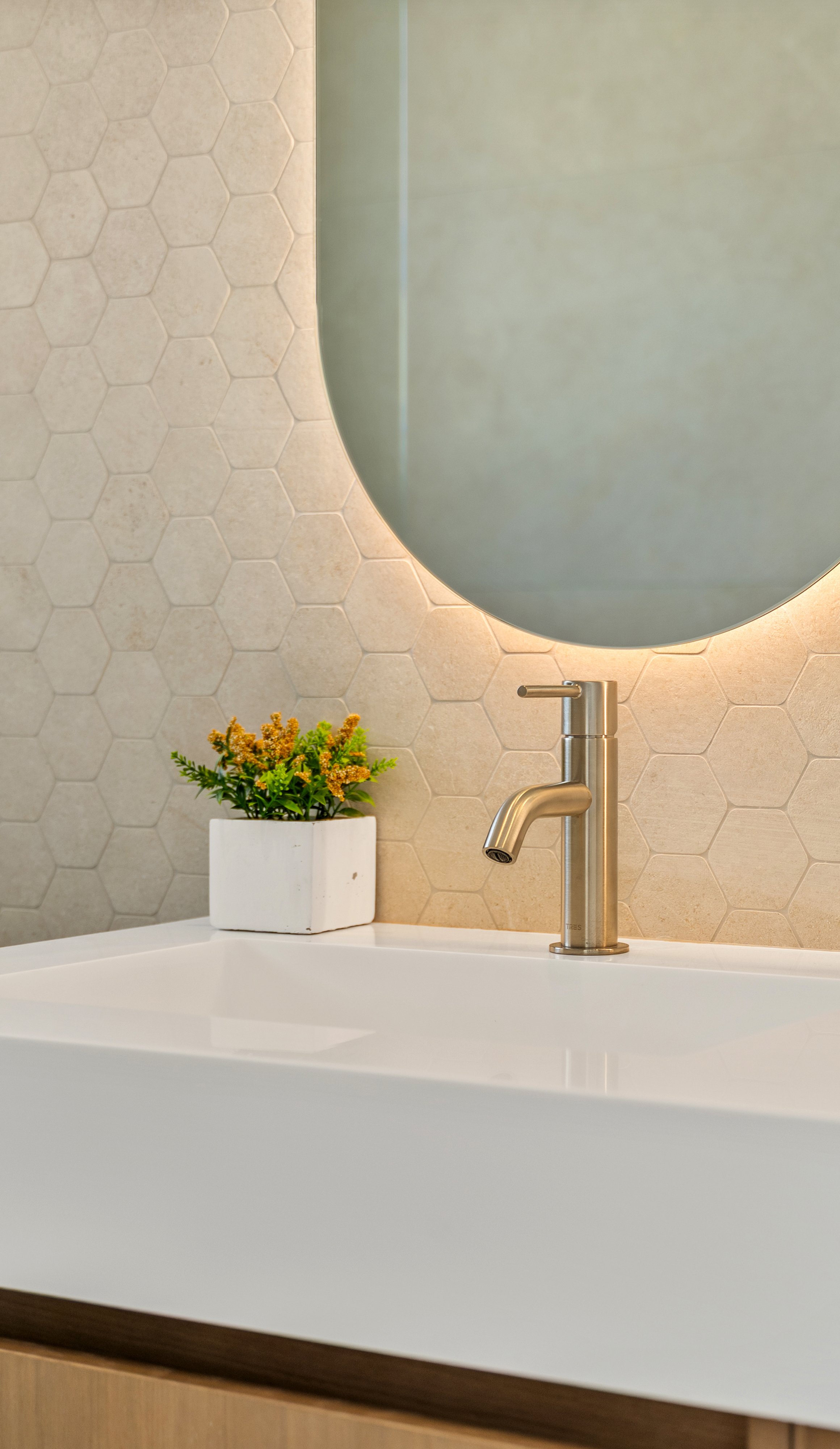 Bathroom with illuminated mirror