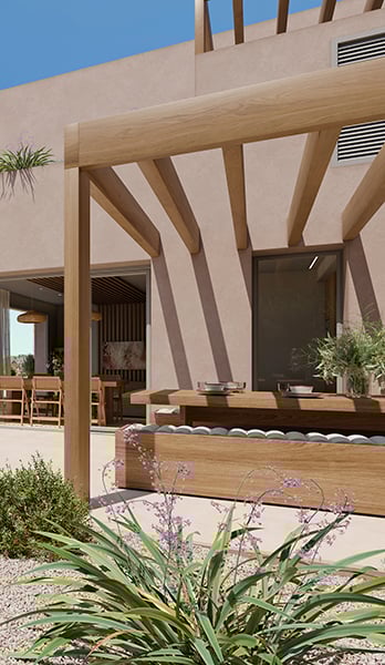 Outdoor dining area for long summer dinners among aromatic plants